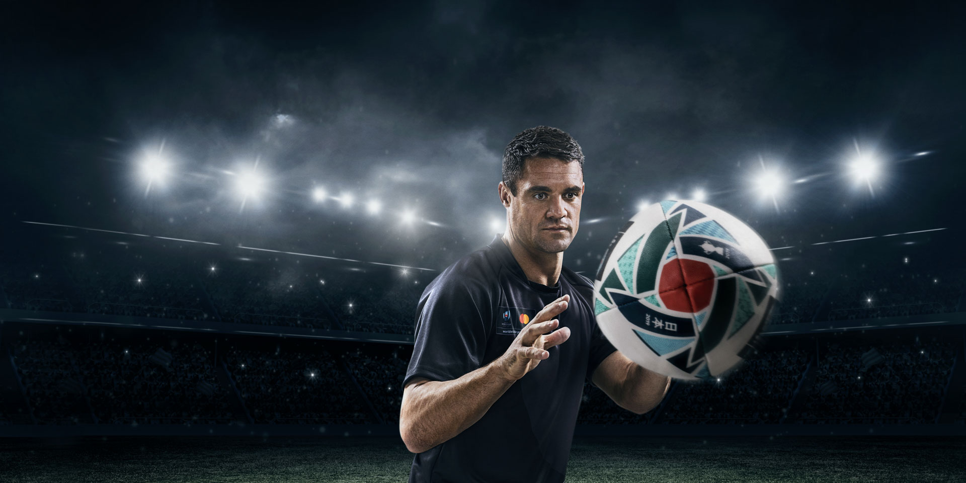 Dan Carter passing a rugby ball in the MasterCard campaign